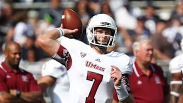 Sep 20, 2014; University Park, PA, USA; Massachusetts Minutemen quarterback Blake Frohnapfel (7) throws a pass during a warmup prior to the game against the Penn State Nittany Lions at Beaver Stadium. Penn State defeated Massachusetts 48-7. Mandatory Credit: Matthew O
