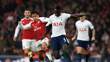 LONDON, ENGLAND - NOVEMBER 18: Davinson Sanchez of Tottenham Hotspur and Alexis Sanchez of Arsenal battle for possession during the Premier League match between Arsenal and Tottenham Hotspur at Emirates Stadium on November 18, 2017 in London, England. (Photo by Shaun Botterill/Getty Images)