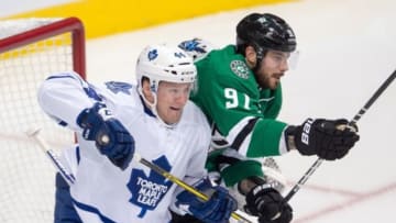 Nov 10, 2015; Dallas, TX, USA; Toronto Maple Leafs defenseman Morgan Rielly (44) defends against Dallas Stars center Tyler Seguin (91) during the first period at the American Airlines Center. The Maple Leafs defeat the Stars 3-2. Mandatory Credit: Jerome Miron-USA TODAY Sports