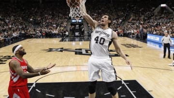 Jan 27, 2016; San Antonio, TX, USA; San Antonio Spurs center Boban Marjanovic (40) dunks the ball as Houston Rockets center Josh Smith (5, left) looks on during the second half at AT&T Center. Mandatory Credit: Soobum Im-USA TODAY Sports