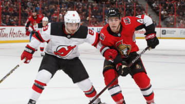 OTTAWA, ON - OCTOBER 19: Jean-Gabriel Pageau #44 of the Ottawa Senators races against Will Butcher #8 of the New Jersey Devils to beat an icing call at Canadian Tire Centre on October 19, 2017 in Ottawa, Ontario, Canada. (Photo by Andre Ringuette/NHLI via Getty Images)
