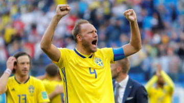 SAINT PETERSBURG, RUSSIA - JULY 3: Andreas Granqvist (C) of Sweden national team celebrates victory during the 2018 FIFA World Cup Russia Round of 16 match between Sweden and Switzerland at Saint Petersburg Stadium on July 3, 2018 in Saint Petersburg, Russia. (Photo by MB Media/Getty Images)