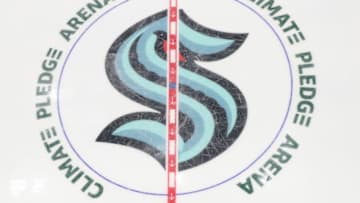SEATTLE, WASHINGTON - OCTOBER 23: A general view of the Seattle Kraken center ice logo is seen during the first period against the Vancouver Canucks in the Kraken's inaugural home opener on October 23, 2021 at Climate Pledge Arena in Seattle, Washington. (Photo by Steph Chambers/Getty Images)