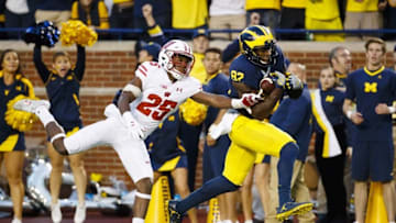 Oct 1, 2016; Ann Arbor, MI, USA; Michigan Wolverines wide receiver Amara Darboh (82) makes a touchdown reception in the fourth quarter defended by Wisconsin Badgers cornerback Derrick Tindal (25) at Michigan Stadium. Michigan won 14-7. Mandatory Credit: Rick Osentoski-USA TODAY Sports