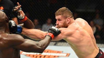 WINNIPEG, CANADA - DECEMBER 16: (R-L) Jan Blachowicz of Poland punches Jared Cannonier in their light heavyweight bout during the UFC Fight Night event at Bell MTS Place on December 16, 2017 in Winnipeg, Manitoba, Canada. (Photo by Josh Hedges/Zuffa LLC/Zuffa LLC via Getty Images)