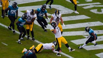 JACKSONVILLE, FL - NOVEMBER 18: Ben Roethlisberger #7 of the Pittsburgh Steelers dives for the go-ahead touchdown during the second half against the Jacksonville Jaguars at TIAA Bank Field on November 18, 2018 in Jacksonville, Florida. (Photo by Ryan Young/Getty Images )