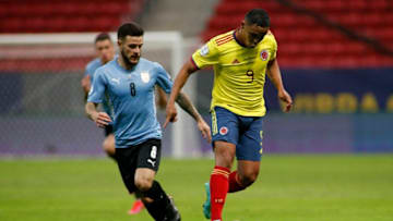 Uruguay's Nahitan Nandez (L) and Colombia's Luis Muriel vie for the ball during their Conmebol 2021 Copa America football tournament quarter-final match at the Mane Garrincha Stadium in Brasilia, Brazil, on July 3, 2021. (Photo by SILVIO AVILA / AFP) (Photo by SILVIO AVILA/AFP via Getty Images)
