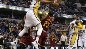 Feb 1, 2016; Indianapolis, IN, USA; Indiana Pacers center Myles Turner (33) blocks the shot by Cleveland Cavaliers forward LeBron James (23) at Bankers Life Fieldhouse. The Cavaliers won 111-106 in overtime. Mandatory Credit: Brian Spurlock-USA TODAY Sports
