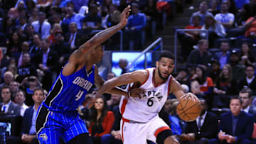 TORONTO, ON - MARCH 27: Cory Joseph #6 of the Toronto Raptors dribbles the ball as Elfrid Payton #4 of the Orlando Magic defends during the second half of an NBA game at Air Canada Centre on March 27, 2017 in Toronto, Canada. NOTE TO USER: User expressly acknowledges and agrees that, by downloading and or using this photograph, User is consenting to the terms and conditions of the Getty Images License Agreement. (Photo by Vaughn Ridley/Getty Images)