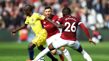 LONDON, ENGLAND - SEPTEMBER 23: N'golo Kante of Chelsea battles for possession with Arthur Masuaku of West Ham United during the Premier League match between West Ham United and Chelsea FC at London Stadium on September 23, 2018 in London, United Kingdom. (Photo by Dan Istitene/Getty Images)