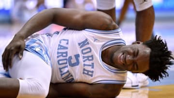 CHAPEL HILL, NORTH CAROLINA - FEBRUARY 11: Nassir Little #5 of the North Carolina Tar Heels reacts after being injured during the first half of their game against the Virginia Cavaliers at the Dean Smith Center on February 11, 2019 in Chapel Hill, North Carolina. (Photo by Grant Halverson/Getty Images)