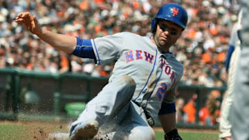 Aug 20, 2016; San Francisco, CA, USA; New York Mets infielder Neil Walker (20) scores in the sixth inning on a base hit by center fielder Justin Raggiano (1) (not pictured) against the San Francisco Giantso at AT&T Park. Mandatory Credit: Lance Iversen-USA TODAY Sports