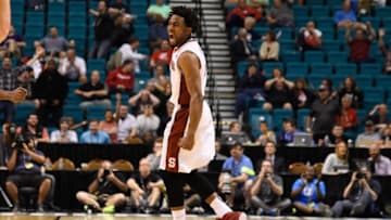 March 11, 2015; Las Vegas, NV, USA; Stanford Cardinal guard Chasson Randle (5) celebrates after making the game-winning basket against the Washington Huskies during the second half in the first round of the Pac-12 Conference tournament at MGM Grand Garden Arena. The Cardinal defeated the Huskies 71-69. Mandatory Credit: Kyle Terada-USA TODAY Sports