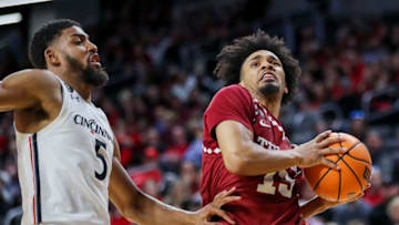 Cincinnati Bearcats guard David DeJulius defends Temple Owls at Fifth Third Arena. USA Today.