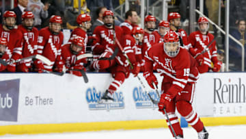 ANN ARBOR, MI - NOVEMBER 24: Wisconsin Badgers defenseman K'Andre Miller (19) skates with the puck during a regular season Big 10 Conference hockey game between the Wisconsin Badgers and Michigan Wolverines on November 24, 2018 at Yost Ice Arena in Ann Arbor, Michigan. (Photo by Scott W. Grau/Icon Sportswire via Getty Images)