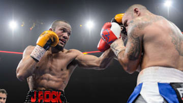 QUEBEC CITY, QC - APRIL 04: Julian Williams lands a punch on Joey Hernandez during the light heavyweight bout at Pepsi Coliseum on April 4, 2015 in Quebec City, Quebec, Canada. Julian Williams defeats Joey Hernandez. (Photo by Minas Panagiotakis/Getty Images)