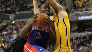 Apr 2, 2014; Indianapolis, IN, USA; Detroit Pistons guard Rodney Stuckey (3) drives to the basket with Indiana Pacers forward Luis Scola (4) defending during the second quarter at Bankers Life Fieldhouse. The Pacers won 101-94. Mandatory Credit: Pat Lovell-USA TODAY Sports