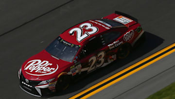 DAYTONA BEACH, FL - JUNE 29: Corey LaJoie, driver of the #23 Dr Pepper Toyota, practices for the Monster Energy NASCAR Cup Series 59th Annual Coke Zero 400 Powered By Coca-Cola at Daytona International Speedway on June 29, 2017 in Daytona Beach, Florida. (Photo by Sarah Crabill/Getty Images)