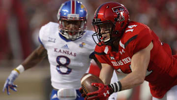 September 29 2016: Texas Tech wide receiver Dylan Cantrell (14) catches a pass during the first half of the Texas Tech Red Raider's game against the University of Kansas Jayhawks at Jones AT