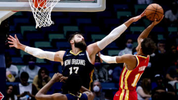 New Orleans Pelicans center Jonas Valanciunas (17) blocks a shot by Atlanta Hawks guard Trae Young (11) Credit: Stephen Lew-USA TODAY Sports
