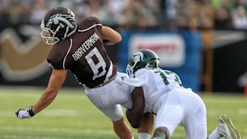 Sep 4, 2015; Kalamazoo, MI, USA; Michigan State Spartans cornerback Vayante Copeland makes a stop on Western Michigan Broncos wide receiver Daniel Braverman (8) during the 1st quarter of a game at Waldo Stadium. Mandatory Credit: Mike Carter-USA TODAY Sports