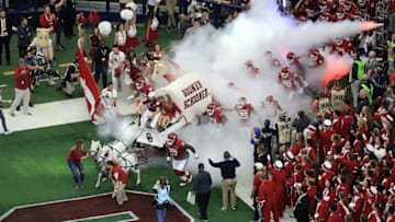 ARLINGTON, TX - DECEMBER 02: The Oklahoma Sooners run onto the field before playing TCU Horned Frogs during Big 12 Championship at AT&T Stadium on December 2, 2017 in Arlington, Texas. (Photo by Ronald Martinez/Getty Images)