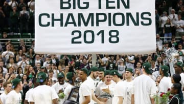 EAST LANSING, MI - FEBRUARY 20: Miles Bridges #22 of the Michigan State Spartans holds the Big Ten trophy after the Spartan defeated the Illinois Fighting Illini at Breslin Center on February 20, 2018 in East Lansing, Michigan. (Photo by Rey Del Rio/Getty Images)