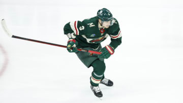 John Klingberg #3 of the Minnesota Wild skates with the puck against the Dallas Stars in the third period of Game Four of the First Round of the 2023 Stanley Cup Playoffs at Xcel Energy Center on April 23, 2023 in St Paul, Minnesota. The Stars defeated the Wild 3-2 to tie the series 2-2. (Photo by David Berding/Getty Images)