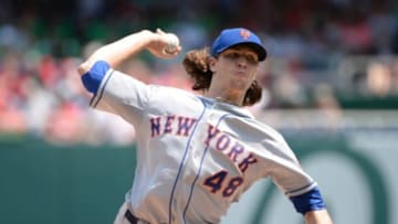 Aug 7, 2014; Washington, DC, USA; New York Mets starting pitcher Jacob deGrom (48) pitches in game against the Nationals at Nationals Park.Mandatory Credit: H.Darr Beiser-USA TODAY Sports