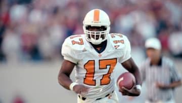 23 Oct 1999: Tee Martin #17 of the Tennessee Volunteers carries the ball during a game against the Alabama Crimson Tide at the Bryant Denny Stadium in Tuscaloosa, Alabama. The Voulunteers defeated the Crimson Tide 21-7. Mandatory Credit: Elsa Hasch /Allsport