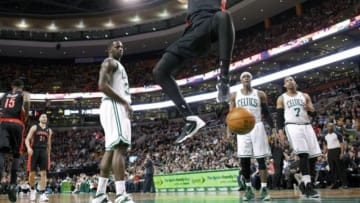 Mar 26, 2014; Boston, MA, USA; Toronto Raptors center Jonas Valanciunas (17) makes the basket against the Boston Celtics in the first quarter at TD Garden. Mandatory Credit: David Butler II-USA TODAY Sports