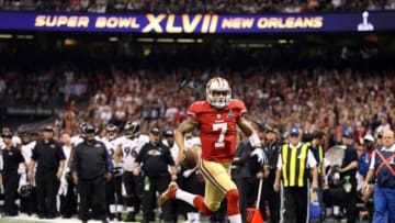 Feb 3, 2013; New Orleans, LA, USA; San Francisco 49ers quarterback Colin Kaepernick (7) scores a touchdown against the Baltimore Ravens in the fourth quarter in Super Bowl XLVII at the Mercedes-Benz Superdome. Mandatory Credit: Mark J. Rebilas-USA TODAY Sports