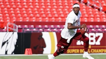 Aug 19, 2013; Landover, MD, USA; Washington Redskins quarterback Robert Griffin III participates in a workout prior to the Redskins game against the Pittsburgh Steelers at FedEx Field. Mandatory Credit: Geoff Burke-USA TODAY Sports