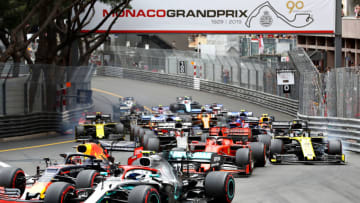 MONTE-CARLO, MONACO - MAY 26: Max Verstappen of the Netherlands driving the (33) Aston Martin Red Bull Racing RB15 and Valtteri Bottas driving the (77) Mercedes AMG Petronas F1 Team Mercedes W10 battle for position at the start during the F1 Grand Prix of Monaco at Circuit de Monaco on May 26, 2019 in Monte-Carlo, Monaco. (Photo by Mark Thompson/Getty Images)