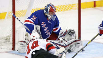 NEW YORK, NEW YORK - JANUARY 09: Igor Shesterkin #31 of the New York Rangers stops a shot from Miles Wood #44 of the New Jersey Devils during the third period at Madison Square Garden on January 09, 2020 in New York City. The Rangers defeated the Devils 6-3. (Photo by Bruce Bennett/Getty Images)