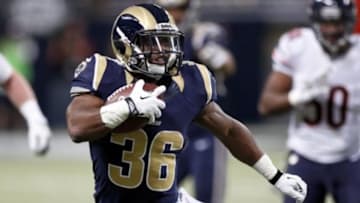 Nov 24, 2013; St. Louis, MO, USA; St. Louis Rams running back Daryl Richardson (26) carries the ball during the third quarter against the Chicago Bears at the Edward Jones Dome. Mandatory Credit: Scott Kane-USA TODAY Sports