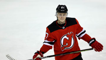 NEWARK, NEW JERSEY - JANUARY 14: Nikita Gusev #97 of the New Jersey Devils skates during warm ups before the home opening game against the Boston Bruins at Prudential Center on January 14, 2021 in Newark, New Jersey. (Photo by Elsa/Getty Images)