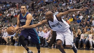 Oct 3, 2016; Dallas, TX, USA; Dallas Mavericks guard C.J. Williams (21) defends against Charlotte Hornets guard Andrew Andrews (1) during the second half at the American Airlines Center. The Mavericks defeated the Hornets 95-88. Mandatory Credit: Jerome Miron-USA TODAY Sports