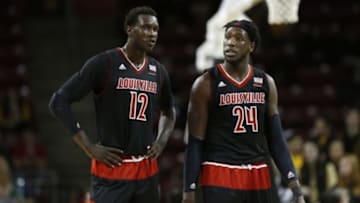 Jan 28, 2015; Chestnut Hill, MA, USA; Louisville Cardinals forward Montrezl Harrell (24) and forward center Mangok Mathiang (12) during the second half against the Boston College Eagles at Silvio O. Conte Forum. Louisville Cardinals won 81-72. Mandatory Credit: Greg M. Cooper-USA TODAY Sports