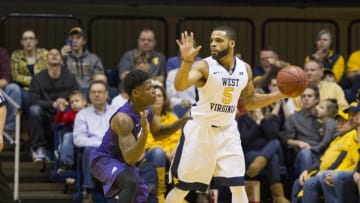 Feb 13, 2016; Morgantown, WV, USA; West Virginia Mountaineers guard Jaysean Paige (5) calls out a play during the first half against the TCU Horned Frogs at the WVU Coliseum. Mandatory Credit: Ben Queen-USA TODAY Sports