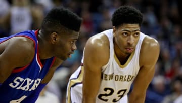 Jan 26, 2015; New Orleans, LA, USA; Philadelphia 76ers center Nerlens Noel (4) talks with New Orleans Pelicans forward Anthony Davis (23) during the second half at the Smoothie King Center. The Pelicans won 99-74. Mandatory Credit: Derick E. Hingle-USA TODAY Sports