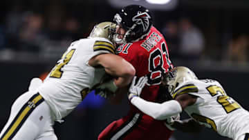 ATLANTA, GA. - DECEMBER 07: Atlanta Falcons tight end Austin Hooper (81) catchs a pass against New Orleans Saints linebacker Manti Te'o (51) on December 07, 2017 at the Mercedes-Benz Stadium in Atlanta, GA. (Photo by Stephen Lew/Icon Sportswire via Getty Images)