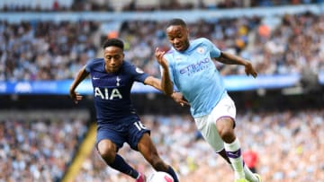 MANCHESTER, ENGLAND - AUGUST 17: Raheem Sterling of Manchester City battles for possession with Kyle Walker-Peters of Tottenham Hotspur during the Premier League match between Manchester City and Tottenham Hotspur at Etihad Stadium on August 17, 2019 in Manchester, United Kingdom. (Photo by Shaun Botterill/Getty Images)