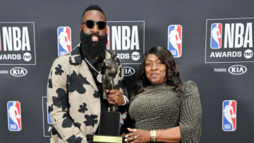 SANTA MONICA, CA - JUNE 25: Houston Rockets G James Harden poses with his mom Monja Willis (Photo by Allen Berezovsky/Getty Images)