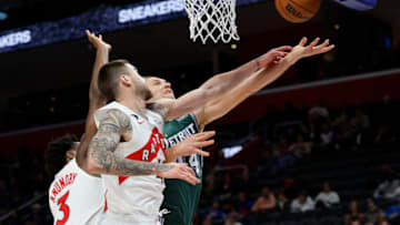 Detroit Pistons forward Bojan Bogdanovic (44) is fouled by Toronto Raptors forward Juancho Hernangomez Credit: Rick Osentoski-USA TODAY Sports