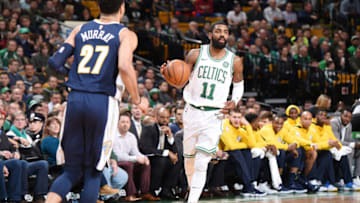 BOSTON, MA - DECEMBER 13: Kyrie Irving #11 of the Boston Celtics handles the ball against the Denver Nuggets on December 13, 2017 at the TD Garden in Boston, Massachusetts. NOTE TO USER: User expressly acknowledges and agrees that, by downloading and or using this photograph, User is consenting to the terms and conditions of the Getty Images License Agreement. Mandatory Copyright Notice: Copyright 2017 NBAE (Photo by Brian Babineau/NBAE via Getty Images)
