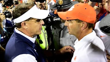 CLEMSON, SC - SEPTEMBER 09: Head coach Dabo Swinney of the Clemson Tigers and head coach Gus Malzahn of the Auburn Tigers shake hands following Clemson's victory over Auburn in the football game at Memorial Stadium on September 9, 2017 in Clemson, South Carolina. (Photo by Mike Comer/Getty Images)