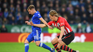 LEICESTER, ENGLAND - JANUARY 12: Marc Albrighton of Leicester City holds off Jannik Vestergaard of Southampton during the Premier League match between Leicester City and Southampton FC at The King Power Stadium on January 12, 2019 in Leicester, United Kingdom. (Photo by Ross Kinnaird/Getty Images)