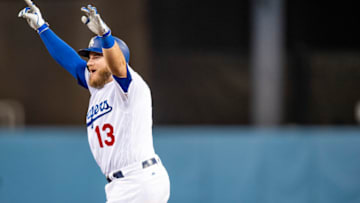 LOS ANGELES, CA - OCTOBER 26: Max Muncy #13 of the Los Angeles Dodgers celebrates his eighteenth inning walk-off home run to defeat the the Boston Red Sox 3-2 in Game Three of the 2018 World Series at Dodger Stadium on October 26, 2018 in Los Angeles, California. (Photo by Billie Weiss/Boston Red Sox/Getty Images)
