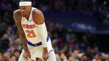 PHILADELPHIA, PA - MARCH 02: Cam Reddish #21 of the New York Knicks looks on against the Philadelphia 76ers at the Wells Fargo Center on March 2, 2022 in Philadelphia, Pennsylvania. The 76ers defeated the Knicks 123-108. NOTE TO USER: User expressly acknowledges and agrees that, by downloading and or using this photograph, User is consenting to the terms and conditions of the Getty Images License Agreement. (Photo by Mitchell Leff/Getty Images)